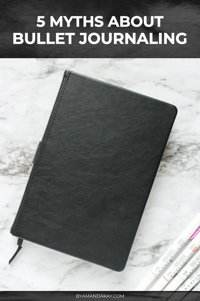 5 myths about bullet journaling cover blank black notebook